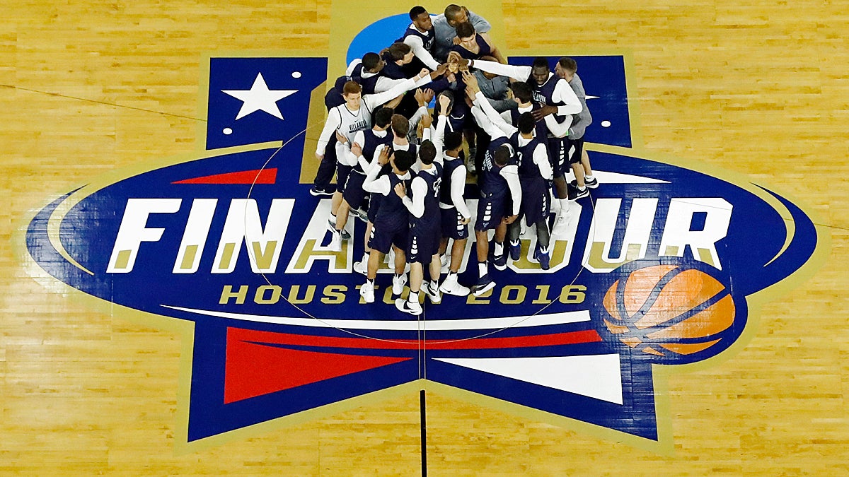 Villanova head coach Jay Wright huddles with his players during a practice session for the NCAA Final Four college basketball tournament Friday in Houston. (David J. Phillip/AP Photo)