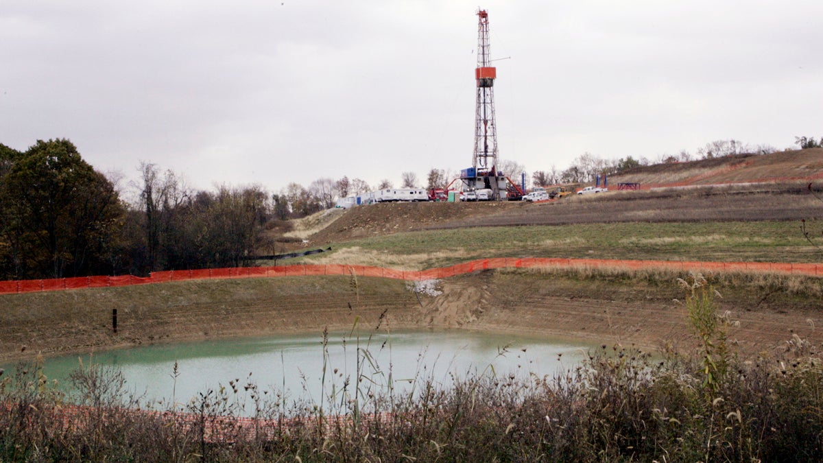 In this file photo, a drilling rig used to bore thousands of feet into the earth to extract natural gas from the Marcellus shale deep underground is seen on the hill above a reservoir in Houston, Pa. Wednesday, Oct. 29, 2008 (Keith Srakocic/AP Photo) 