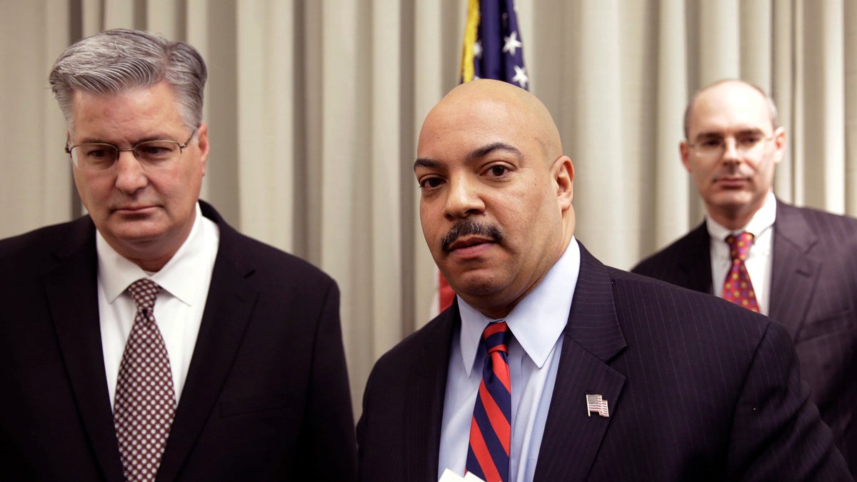  Philadelphia District Attorney Seth Williams accompanied by investigators Marc Costanzo, (left), and Frank Fina, after a news conference Monday, Jan. 27, 2014, in Philadelphia. (Matt Rourke/AP Photo) 