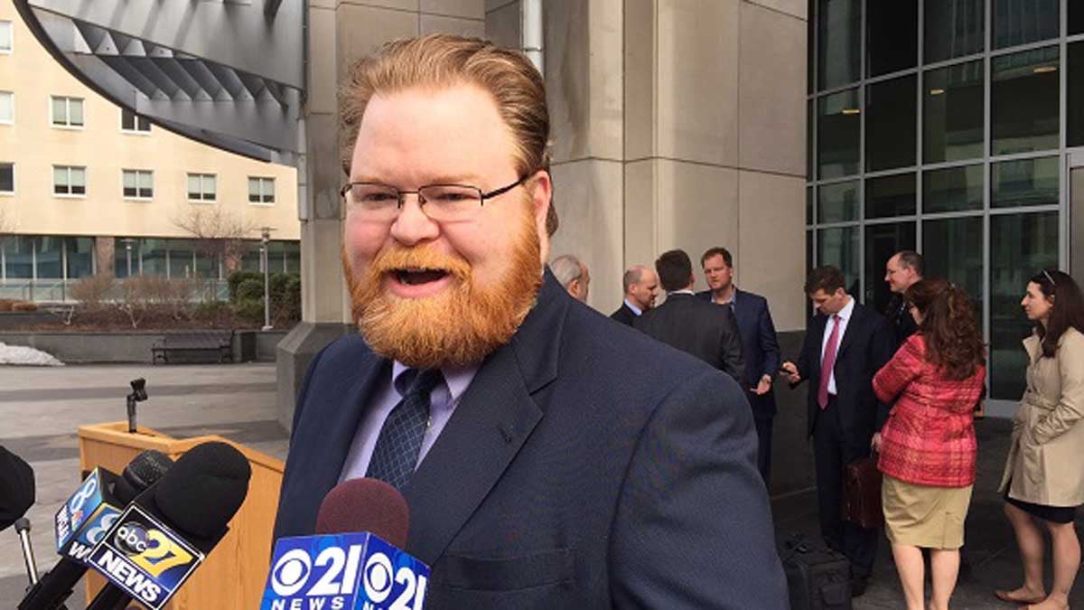  Erik Arneson, fired by Gov. Tom Wolf from his post as director of Pennsylvania's Office of Open Records, answers questions  in front of Commonwealth Court Wednesday. (Mary Wilson/WHYY) 