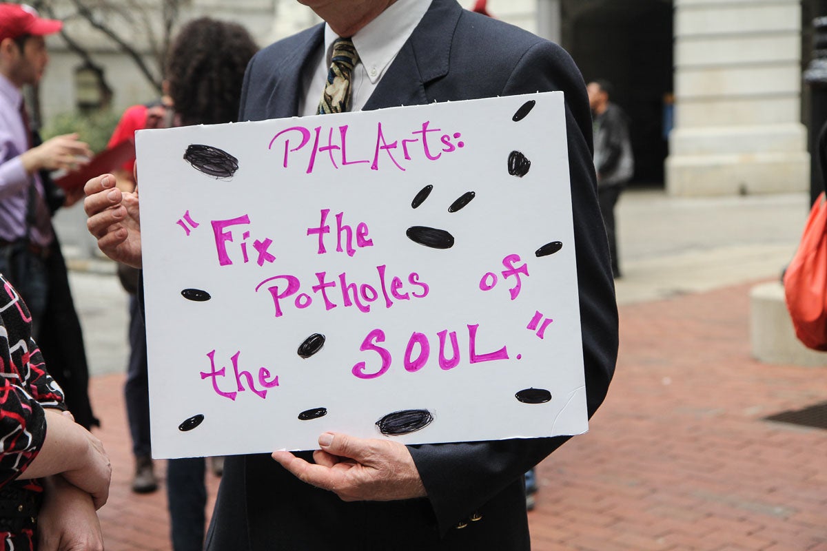 Arts supporters gather in the courtyard of City Hall in Philadelphia to rally for arts funding. (Kimberly Paynter/WHYY)