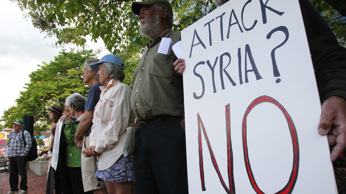  American protestors stand in opposition to military action in Syria. (AP Photo/Toby Talbot, file) 