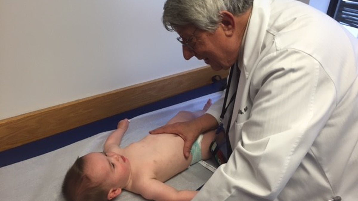 Dr. Stephen Ludwig with one of his tiny patients. (Courtesy of Dr. Stephen Ludwig)