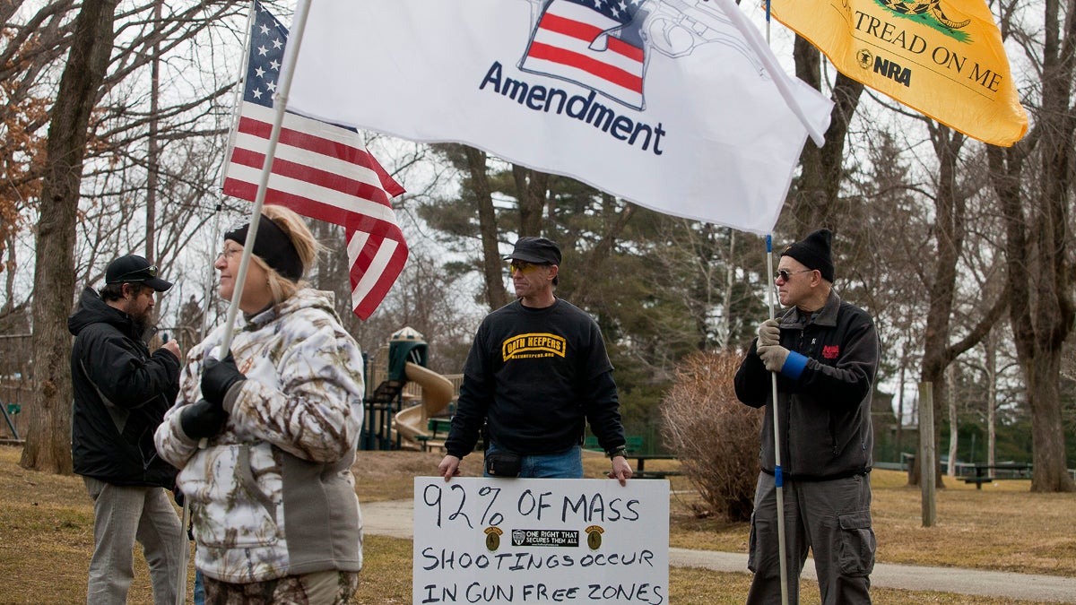  Jim, who declined to provide a last name, of Langhorne holds a sign citing a statistic at a rally in support of the Second Amendment in Bala Cynwyd on Sunday. (Brad Larrison/for NewsWorks) 