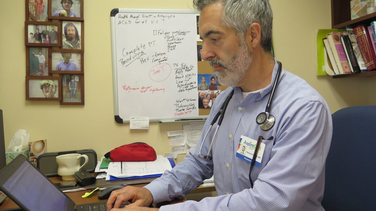  Dr. Richard Rayner works at Harrisburg’s Aspire Clinic with nurse practitioners. But, he says, the 'collaborative agreement' should remain in place.(Ben Allen/WITF) 