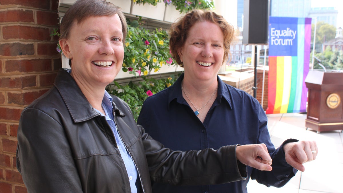  Isabelle Barker (left) and Cara Palladino filed a lawsuit in federal court today, arguing that Pennsylvania should recognize their 2005 marriage in Massachusetts. (Emma Jacobs/WHYY) 