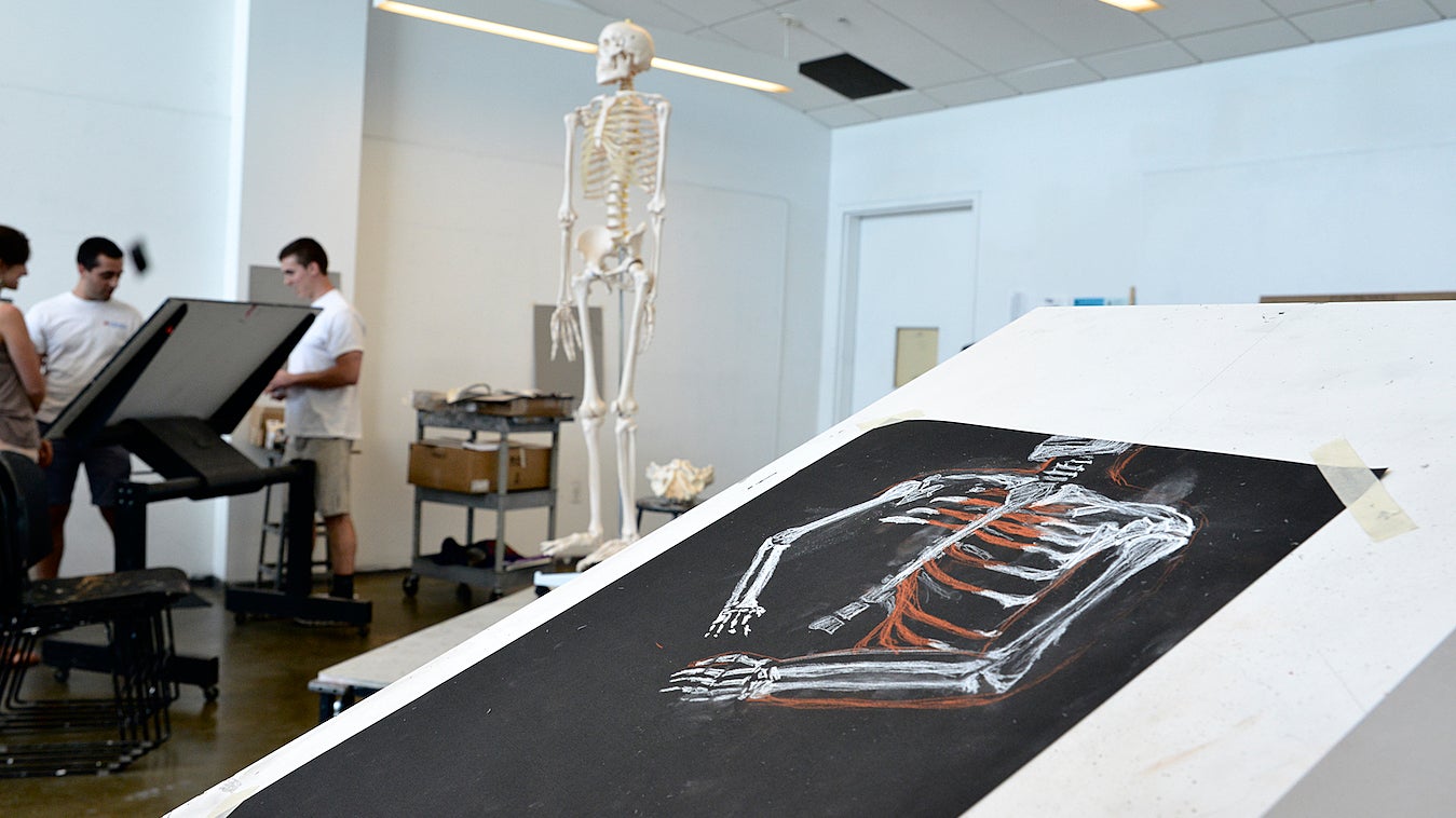 The assignment is to draw a composite of the skeleton anatomy based on the visual observation of the present (but not pictured) nude model. (Bastiaan Slabbers for NewsWorks)
