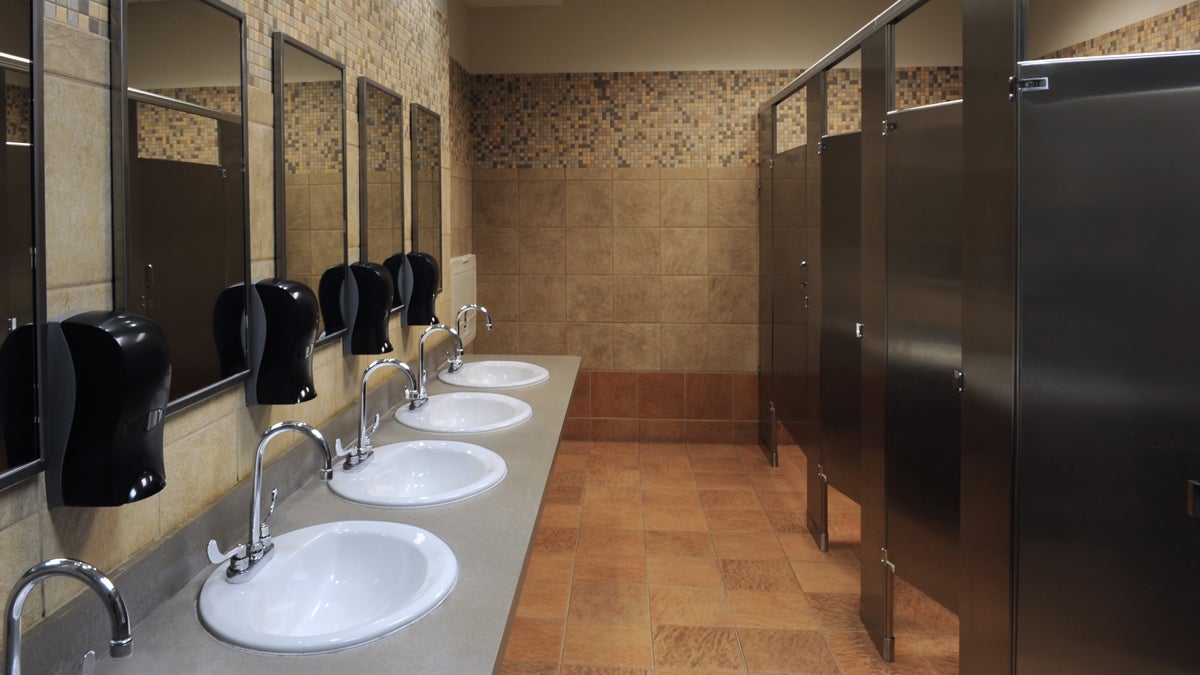 A new survey shows that many people use their work bathroom for reasons you wouldn't expect