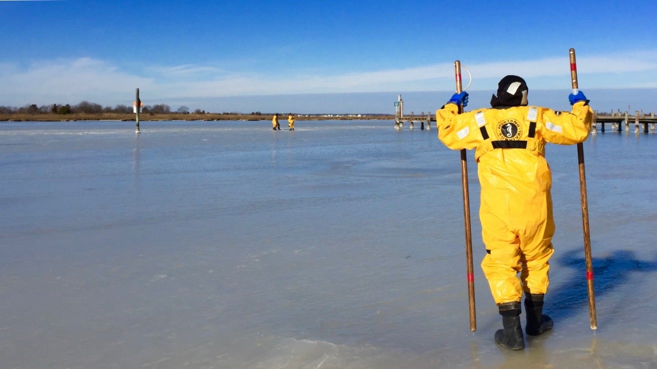 Seaside Park Volunteer Fire Department members conducting an ice rescue drill on the Barnegat Bay in Jan. 2015. (Photo: Justin Auciello/for NewsWorks)