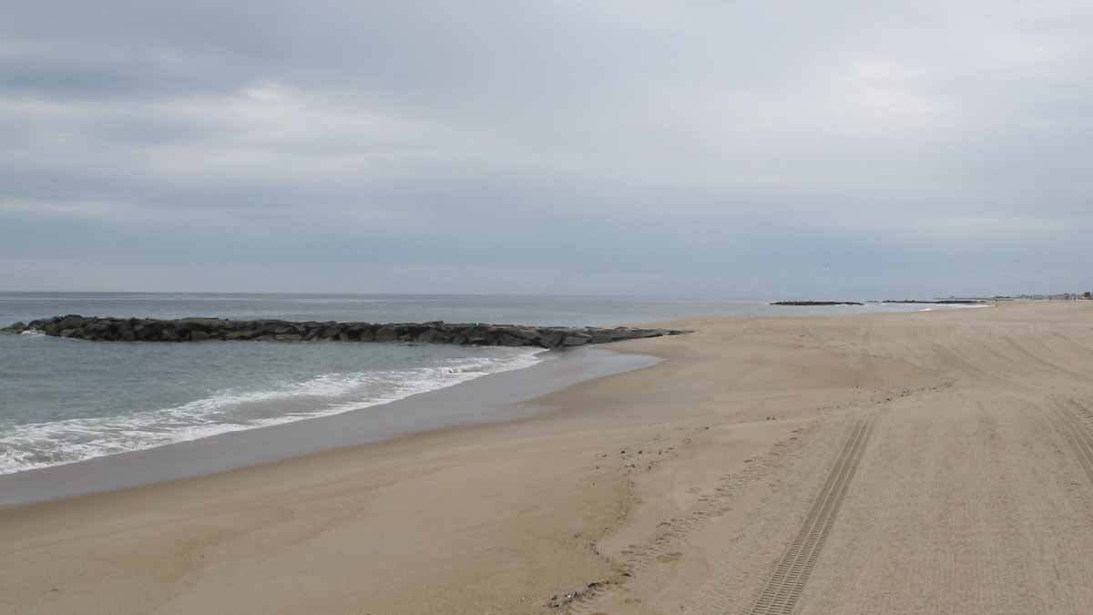  The Belmar beach stretches out before the beginning of the Memorial Day weekend. (Phil Gregory/WHYY) 