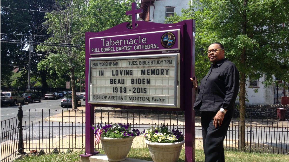 File - Bishop Aretha Morton stands beside the marquee at Tabernacle Full Gospel Baptist Cathedral in Wilmington. (Avi Wolfman-Arent/WHYY) 