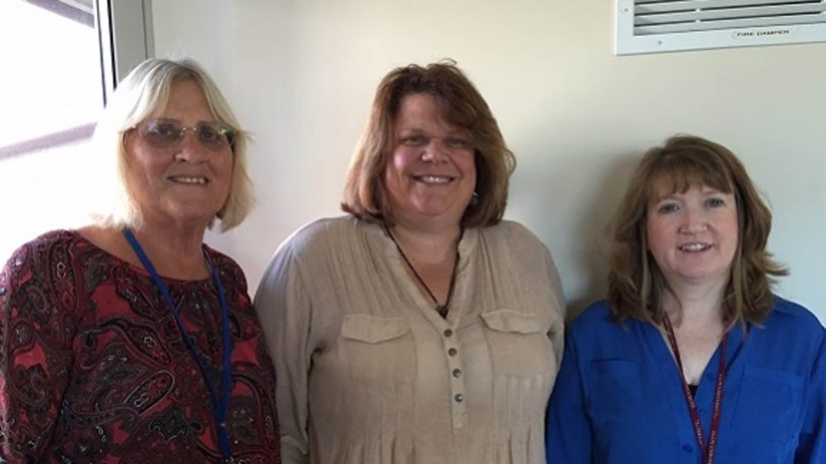  Joan Crater, Tracey York, and Mary Kay Bernosky of Berks Women in Crisis. (Mary Wilson/WHYY) 
