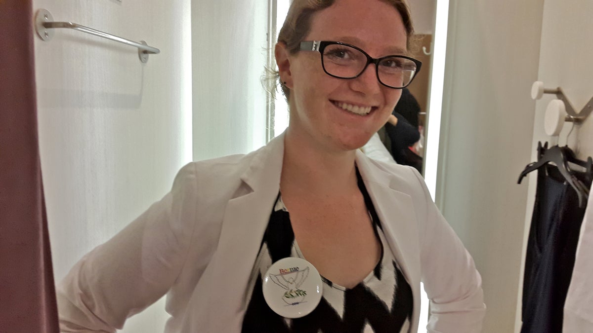 First-time delegate Sabrina Febrigo shops for professional clothing to wear to the Democratic National Convention. (Laura Benshoff/WHYY)