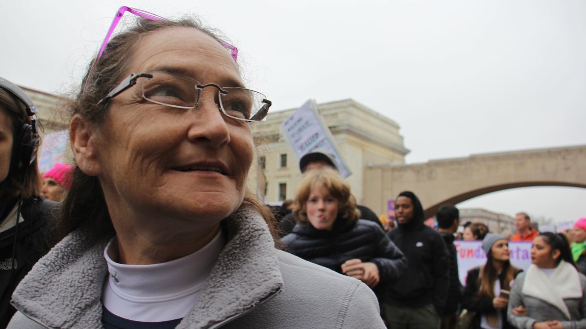 Betsy Michallow of West Chester marches toward the National Mall. Her trip to Washington was sponsored by the Women's March group in Chester County. (Emma Lee/WHYY)