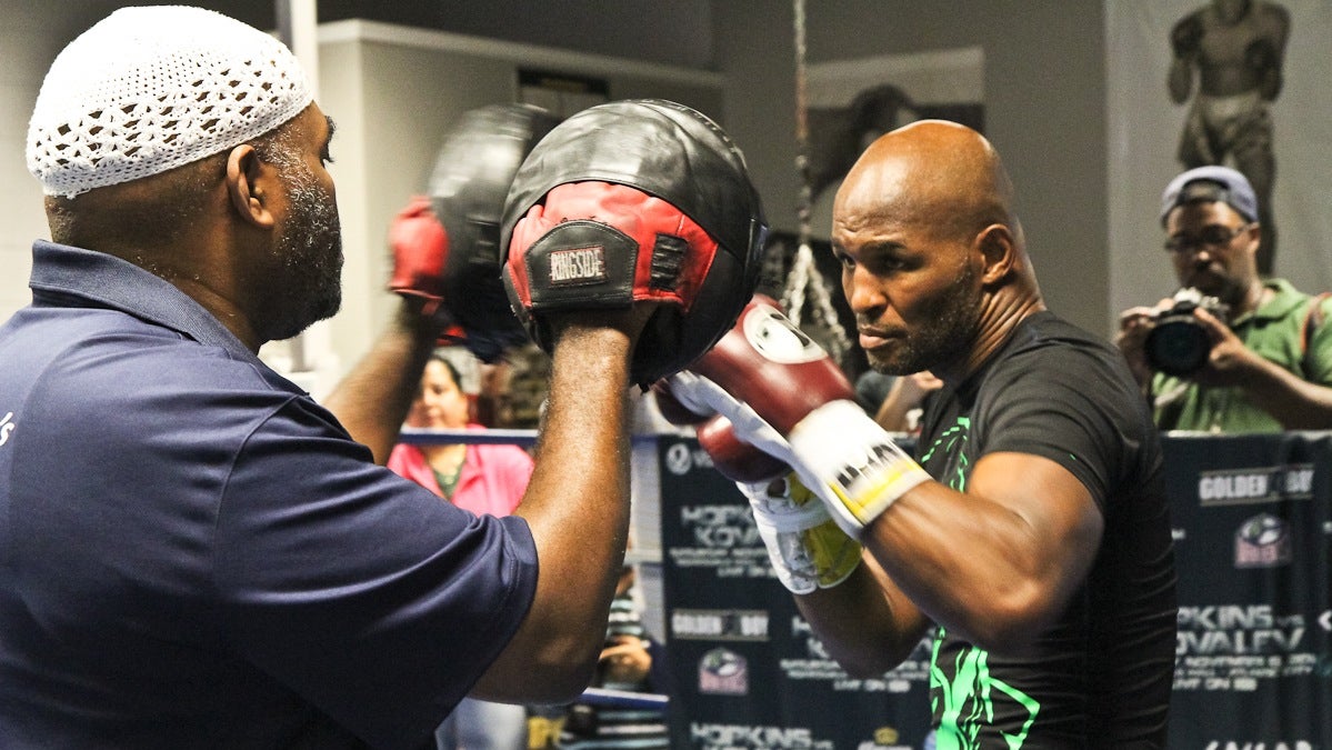 Bernard Hopkins works out with trainer Naazim Richardson at Joe Hand boxing gym in Philadelphia. (Kimberly Paynter/WHYY)
