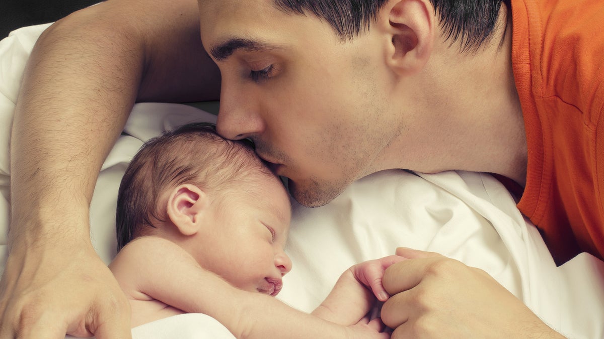 (<a href='http://www.bigstockphoto.com/image-81607592/stock-photo-loving-father-kissing-his-new-born-baby'>Big Stock</a>)