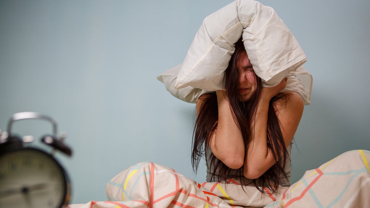 (logoff/<a href='http://www.bigstockphoto.com/image-122225891/stock-photo-woman-with-a-pillow-over-head'>Big Stock Photo</a>