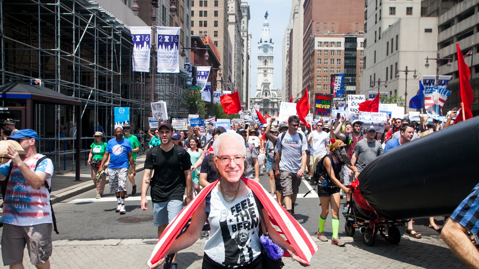 Pro-Bernie Sanders demonstrators march down South Broad Street during the Democratic National Convention. (Brad Larrison for NewsWorks)