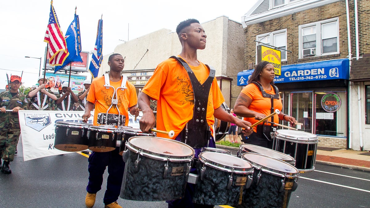  The drumline from Distressed Illusions marches down Rising Sun Avenue (Brad Larrison/for NewsWorks) 
