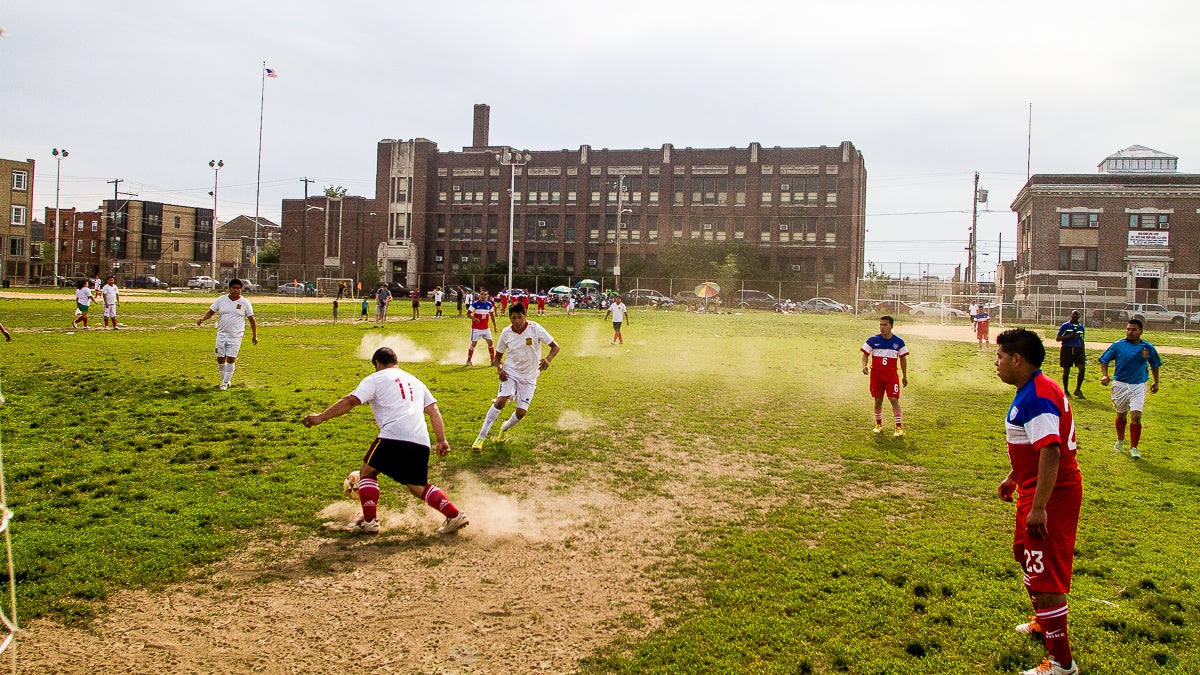  Soccer fans of Mexican descent play a recreational game at Jefferson Square in South Philly. (Brad Larrison/for NewsWorks) 
