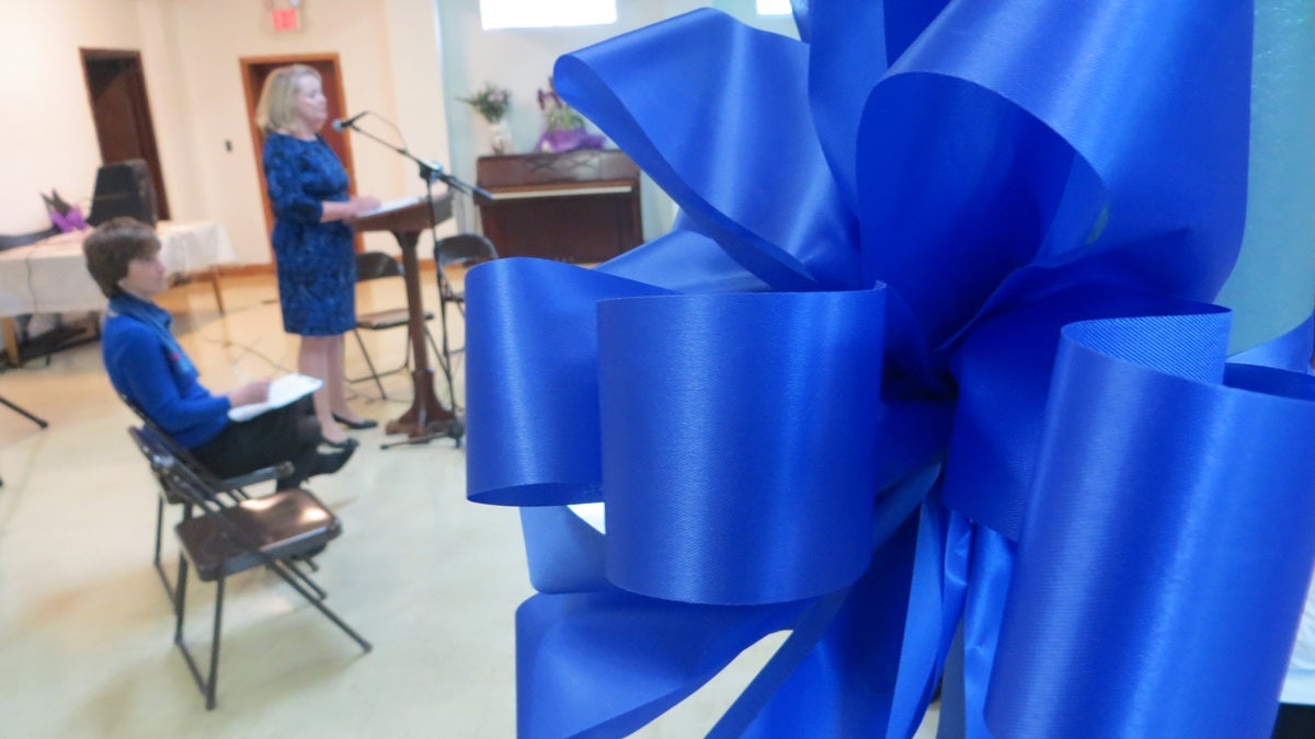  Dr. Vicky Kelly, director of the Del. Div. of Family Services speaks at the Blue Bow campaign launch event in Wilmington. (Mark Eichmann/WHYY) 