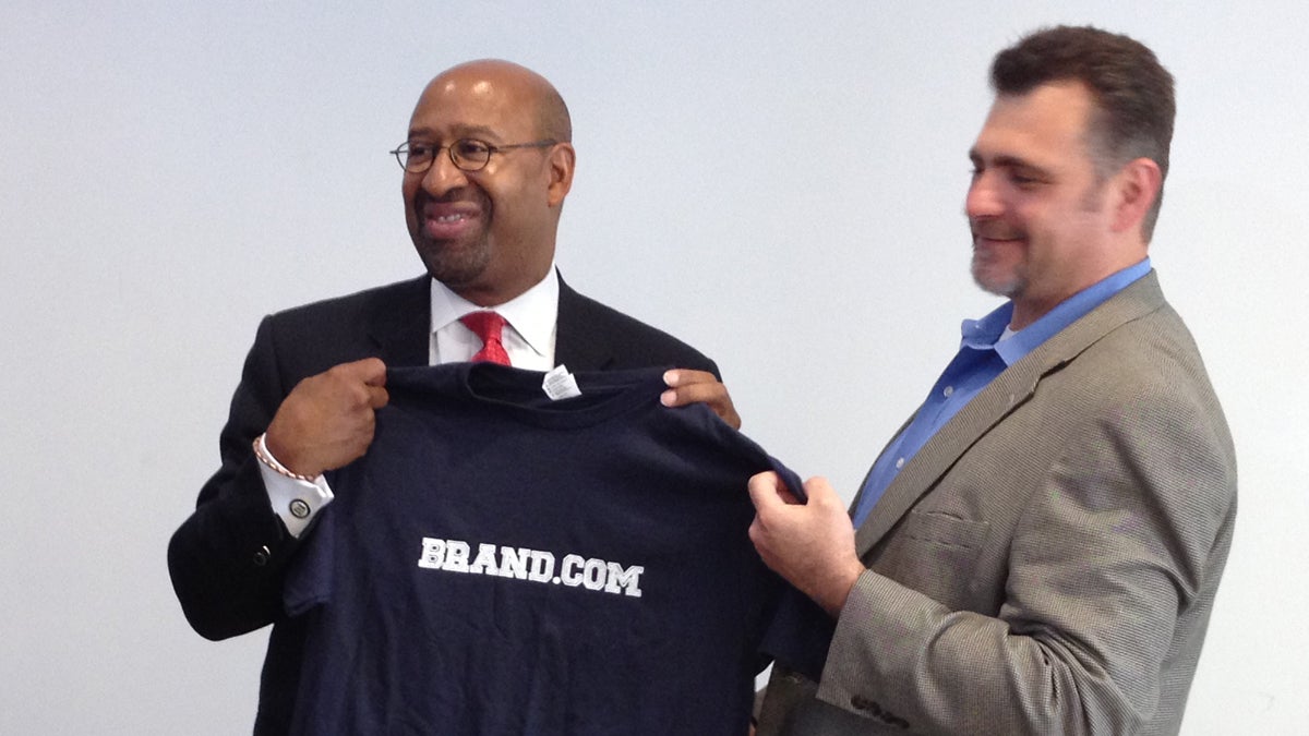  Philadelphia Mayor Michael Nutter with Brand.com President Michael Zammuto. (Zack Seward/WHYY) 