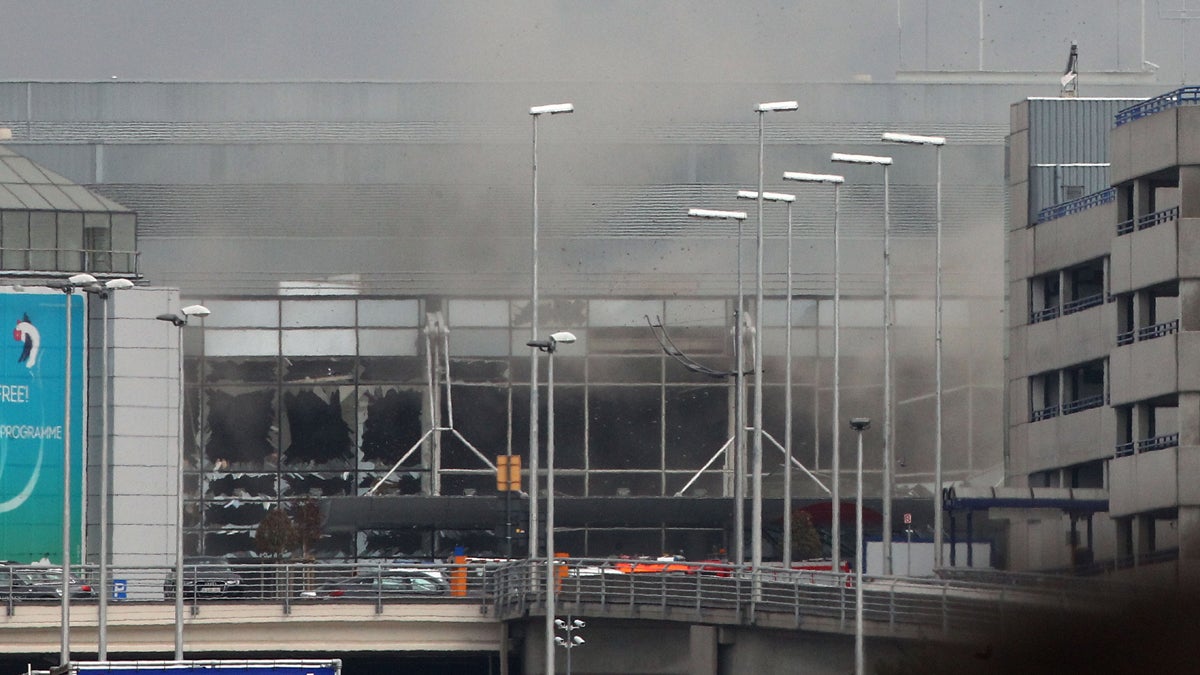 Smoke billows from the  Zaventem Airport after a controlled explosion in Brussels