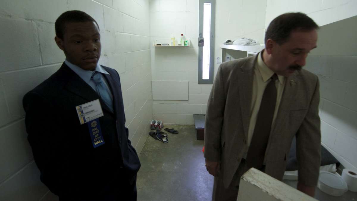  Tyreek Stotts and Prison Commissioner Louis Giorla inspect one of the two-inmate cells. There are currently an estimated 8,500 inmates being held within the correctional facility's 13 units. (Bas Slabbers/for NewsWorks) 