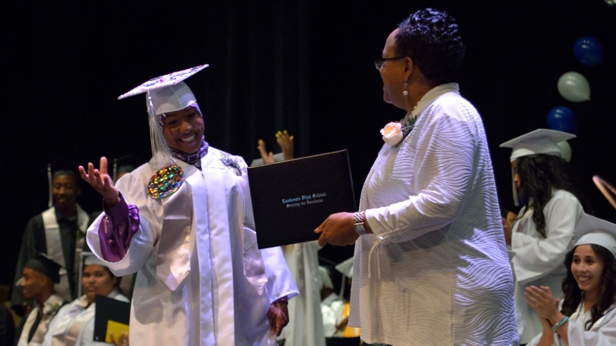  Lankenau High School students receive their diplomas at the 2014 commencement. Lankenau is one of five Philadelphia schools cited for making 'high progress' in state assessments. (Bas Slabbers/for NewsWorks) 