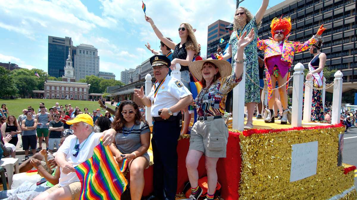 The 2025 Philly LGBT Pride grand marshal's float is shown passing by Independence Hall. (Baastian Slabbers for NewsWorks)