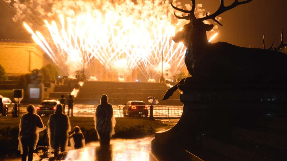 Rain and fog obscures most of the fireworks grande finale. (Bastiaan Slabbers for NewsWorks)