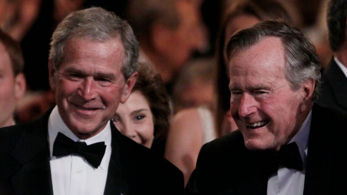  Former Presidents George H. W. Bush, right, and George W. Bush, left. (Carolyn Kaster/AP Photo, file) 