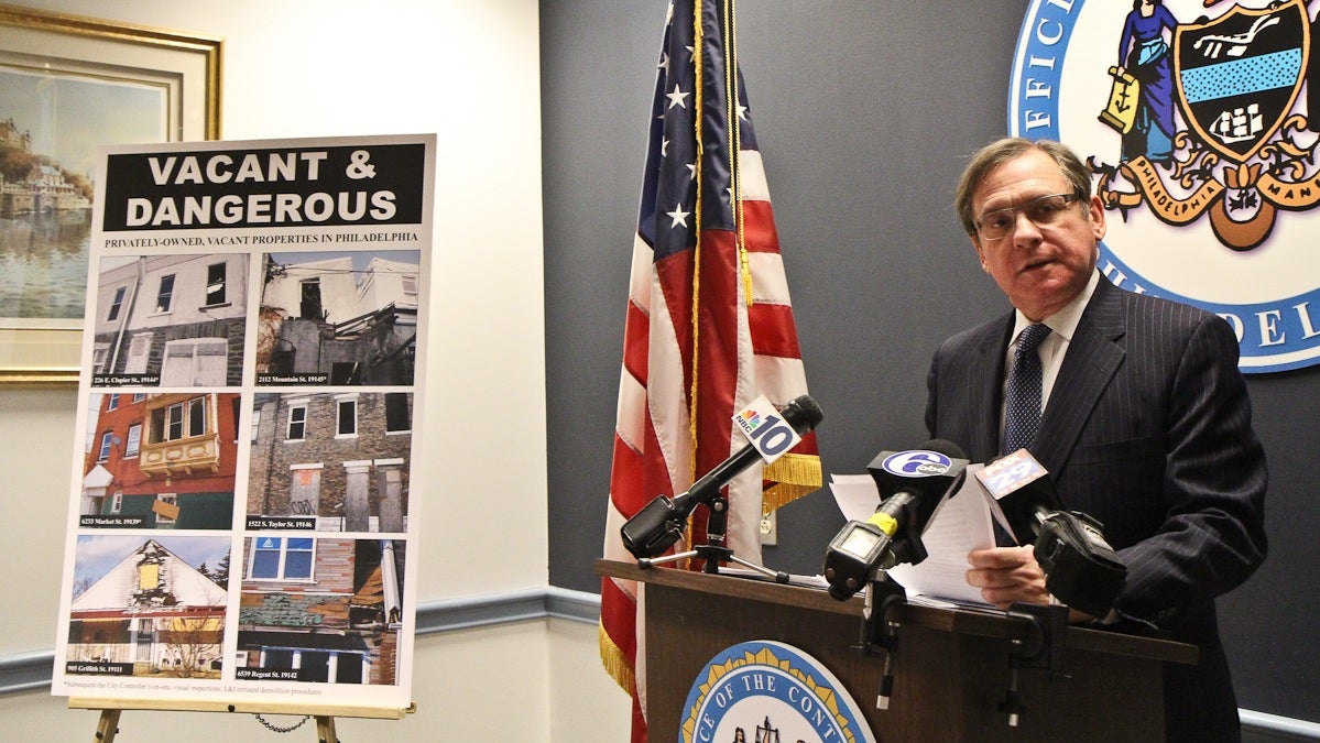  Philadelphia City Controller Alan Butkovitz speaks at a press conference Wednesday about vacant properties posing a danger in the city. (Kimberly Paynter/WHYY) 