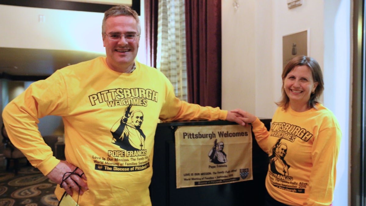  John Cascino and Becky Cascino show their Pittsburgh pride at a welcoming reception for pilgrims in Philadelphia. (Marielle Segarra/WHYY) 