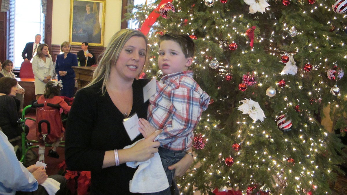  Old Bridge resident Michelle Hansen and her son, Ryan, attend ceremonies at the New Jersey Statehouse to highlight the Catastrophic Illness in Children Relief Fund.(Phil Gregory/WHYY) 