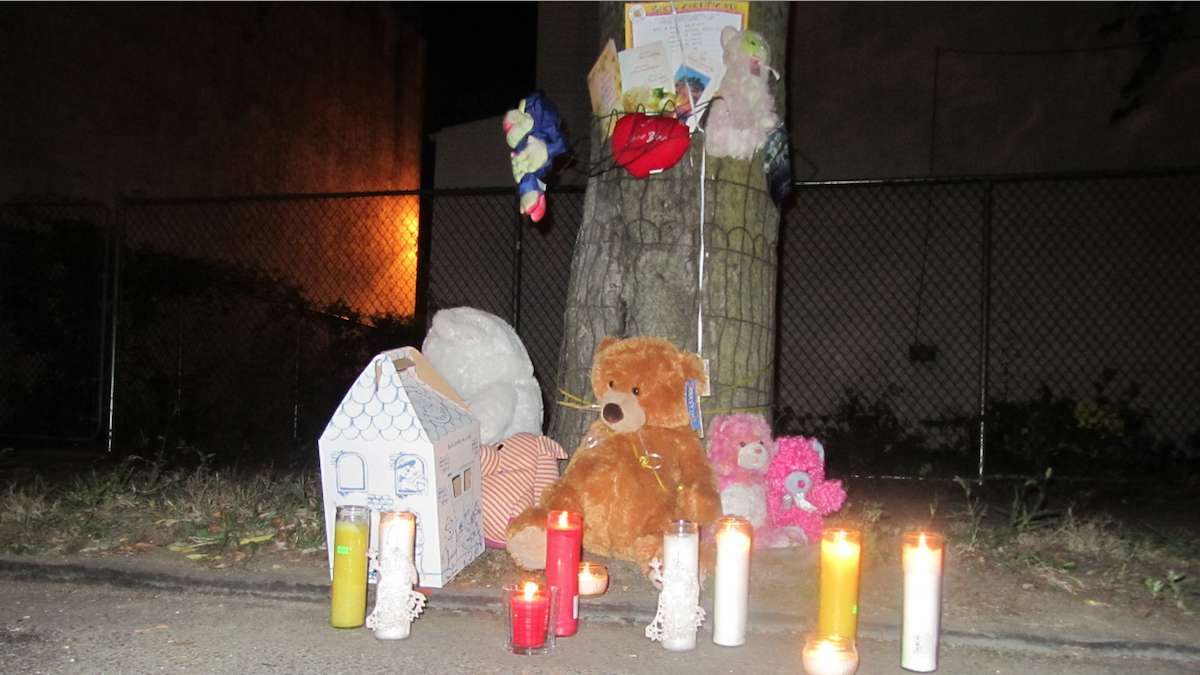  A memorial honoring Ceeanna Pate sits at the corner of Clarissa and Brunner streets in Nicetown during a recent vigil in her memory. (Brian Hickey/WHYY) 
