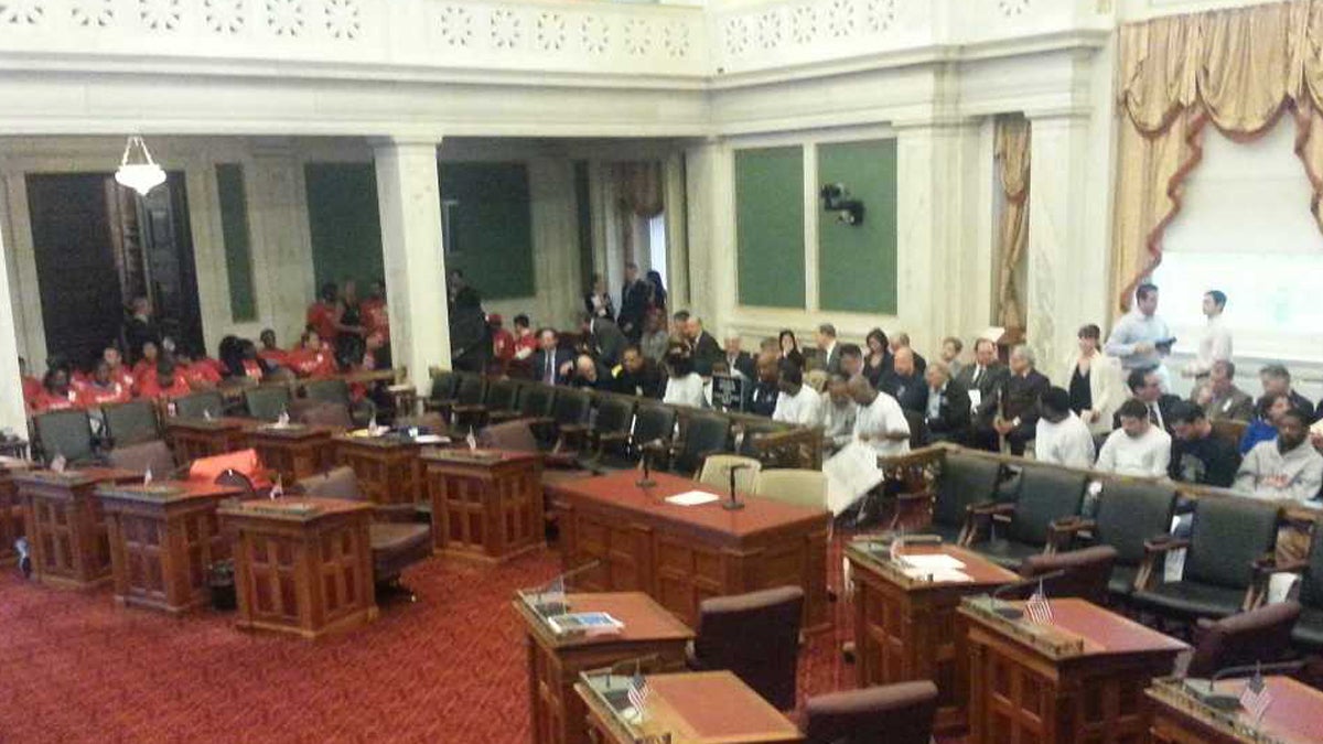  Those for and against Tax Increment Financing for a new hotel turned out in force at Philadelphia City Council.  (Tom MacDonald/WHYY) 