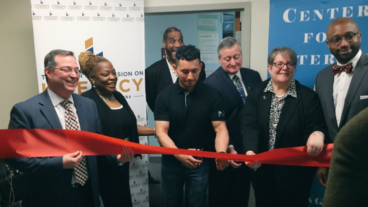 Omar Diaz and Mayor Kenney cut the official ribbon making the Center for Literacy on 4th and Market Streets a myPLACE campus! (Image via Center for Literacy Facebook)