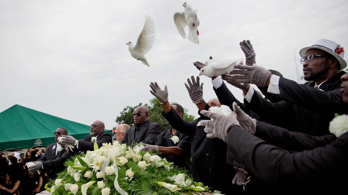  Pallbearers are shown releasing doves over the casket of Ethel Lance during her burial service on June 25, 2015, in Charleston, S.C. It was the first funeral for the nine people killed in the shooting at Emanuel AME Church, (AP Photo/David Goldman) 