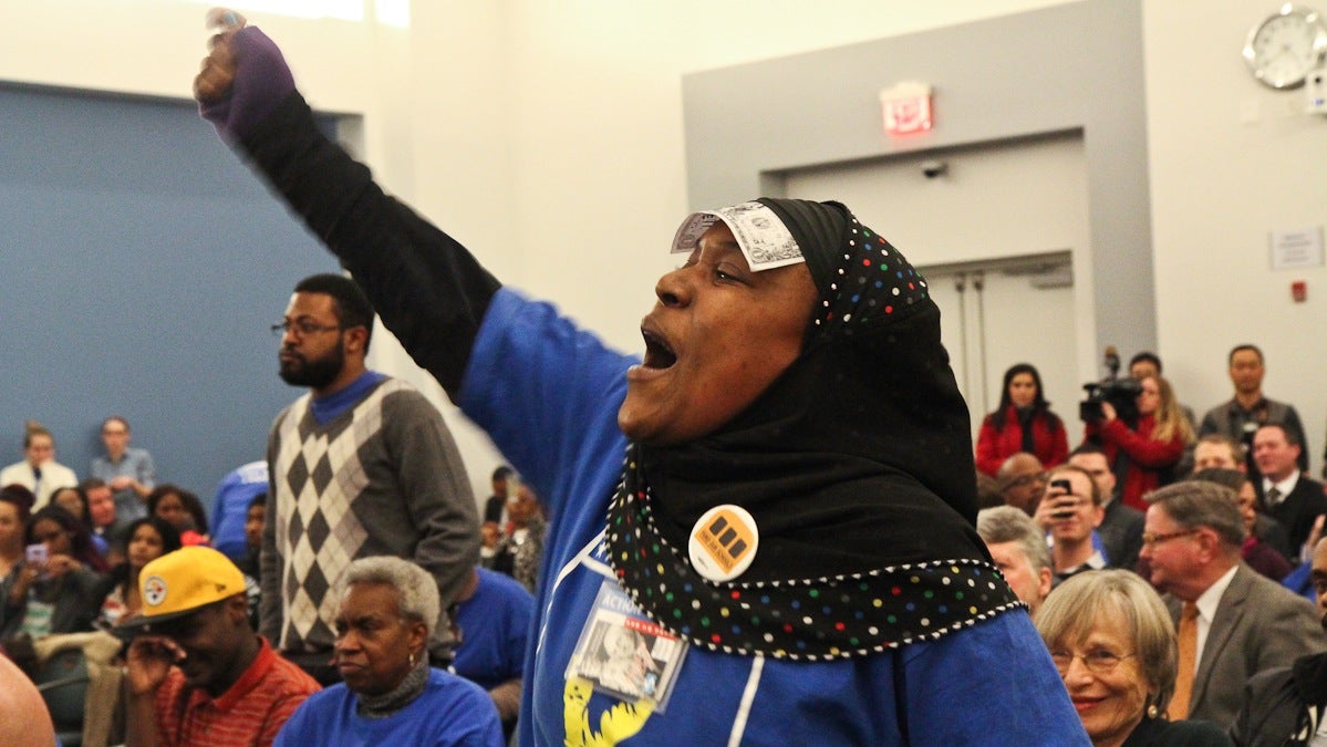 Tyesha Anderson protests charter expansion at Wednesday's charter hearings. (Kimberly Paynter/WHYY) 