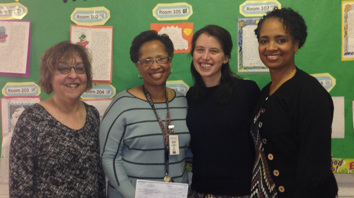  Left to right: Elayne Bender of East Mt. Airy Neighbors, Principal Karen White of A. B. Day, Abby Thaker of Mt. Airy USA and Karima Bouchenafa of West Mt. Airy Neighbors. (Courtesy of the Mt. Airy Schools Coalition) 
