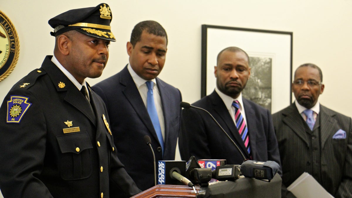 Chester Police Commissioner Darren Alston (left) says he will subject his force to a U.S. Deparment of Justice review examining officer-involved shootings and community policing practices. With him are (from left) U.S. Attorney Zane Memeger