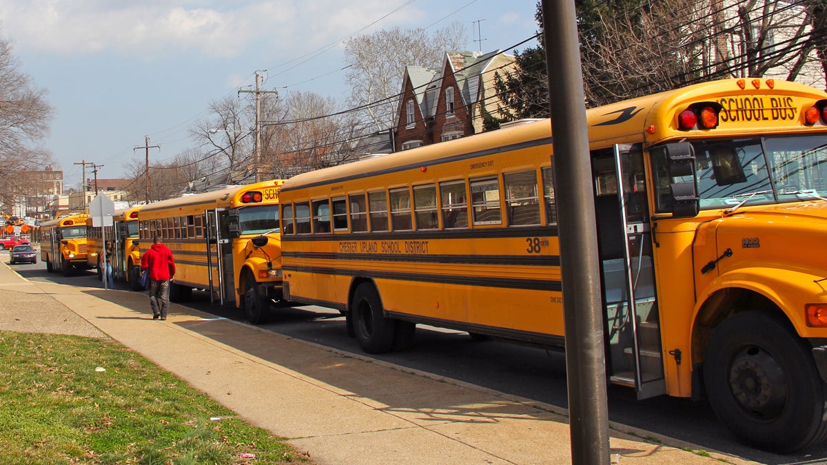  Buses await dismissal on West Ninth Street in front of Chester High School. (Emma Lee/for NewsWorks) 