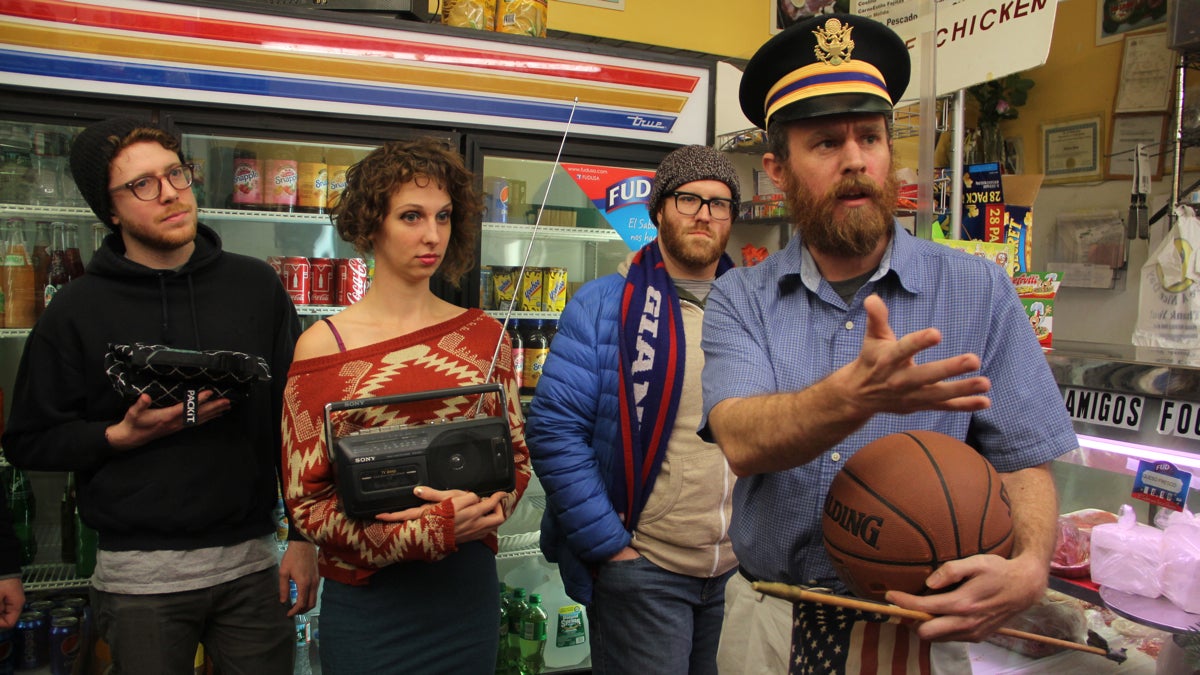 Chris Davis (right) performs his one-man play about the Mexican-American War in a butcher's shop in the Italian Market. (Emma Lee/WHYY)