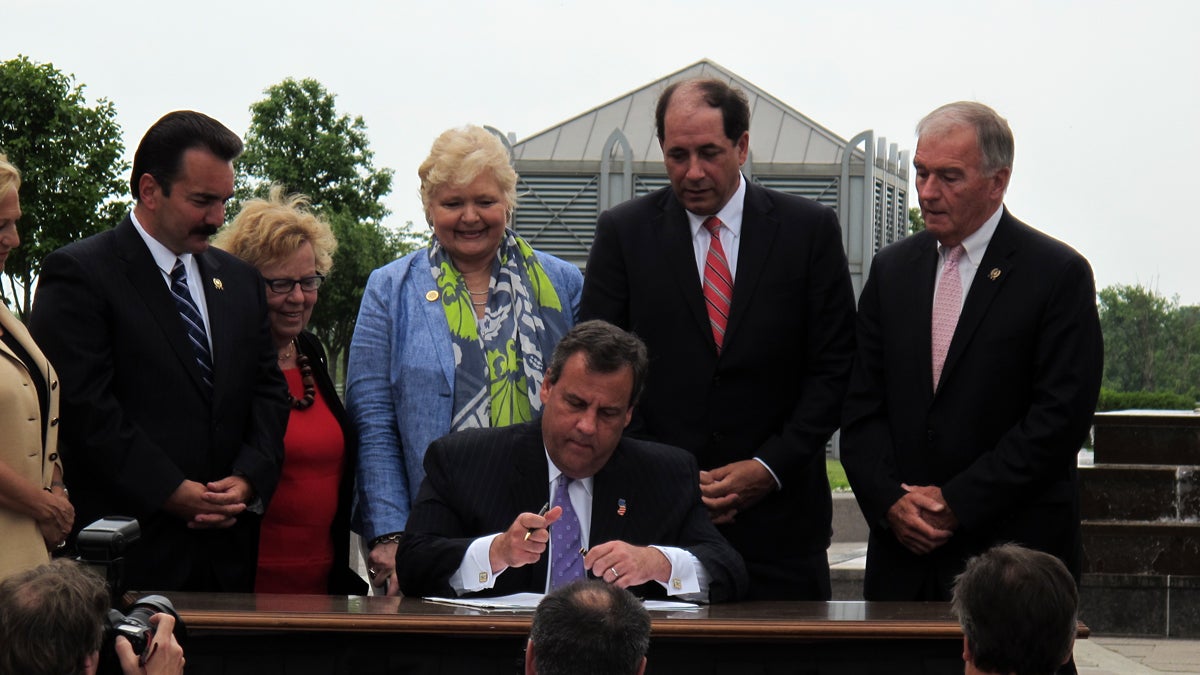  N.J. Gov. Chris Christie signs the adoption records access bill into law. (Phil Gregory/for NewsWorks) 
