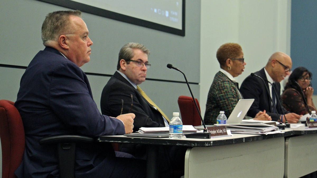 Temple Professor Christopher McGinley (left) attends his first meeting as a member of the School Reform Commission. (Emma Lee/WHYY)
