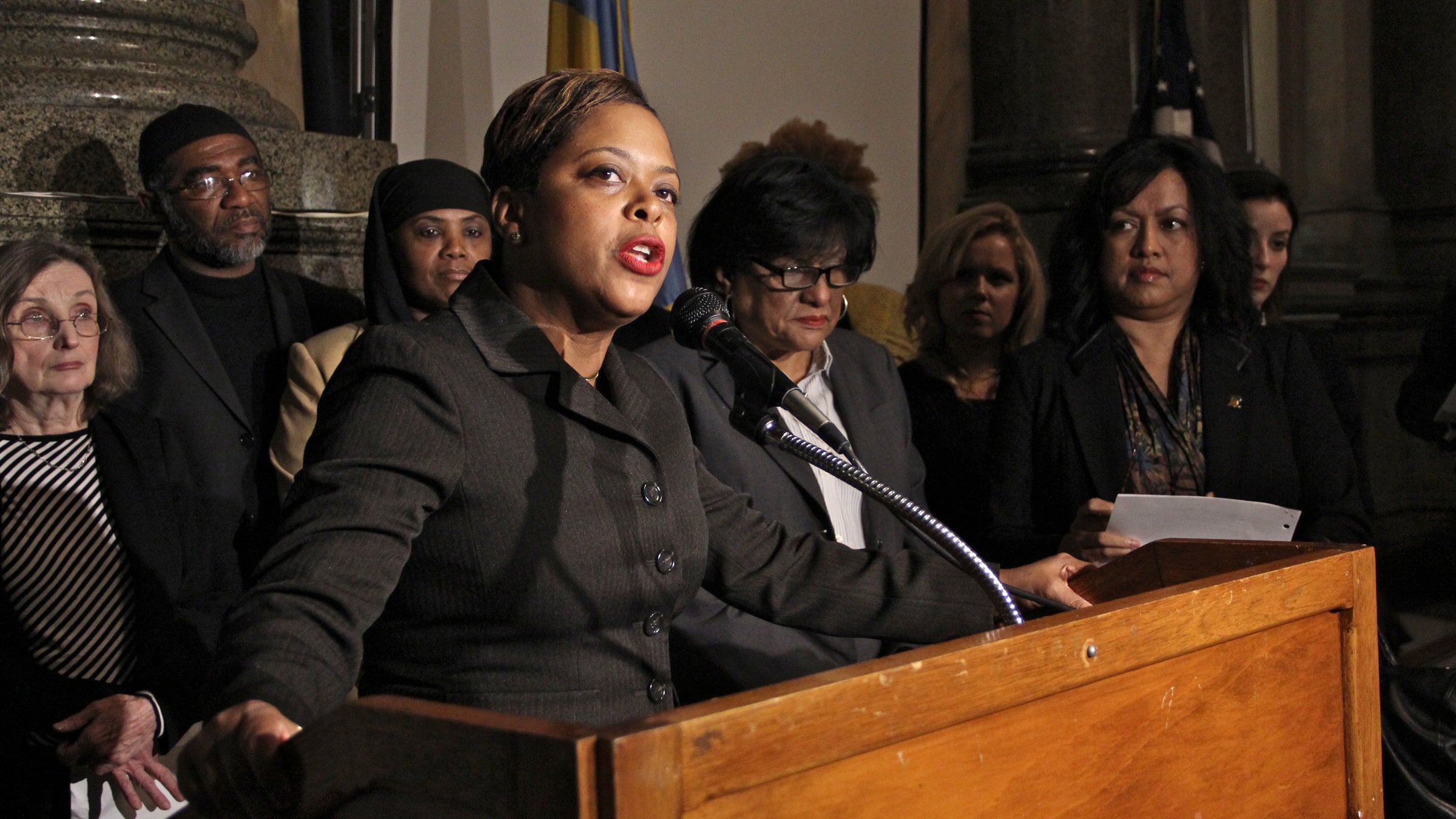  Cindy Bass joins other female City Council members and representatives of the Philadelphia Chapter of the National Organization for Women to call for the firing of three city prosecutors who traded pornographic emails while working for the state Attorney General. (Emma Lee/WHYY) 