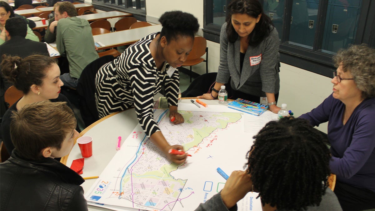 Octavia Howell, formerly of the Philadelphia City Planning Commission, records residents' input on the Lower Northwest District Plan. (Matthew Grady/WHYY) 
