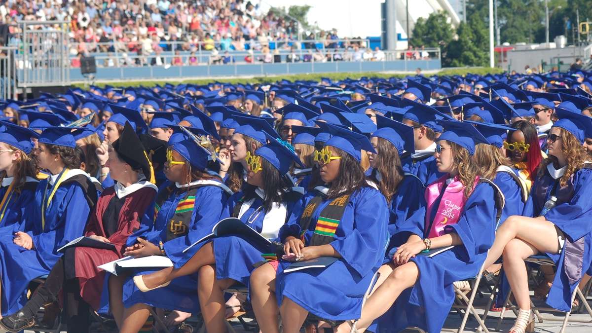  The UD class of 2014 attends graduation at Delaware Stadium in May. (Shana O'Malley/WHYY) 