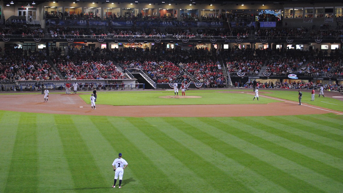  The Lehigh Valley Iron Pigs play the Pawtucket Red Sox at Coca-Cola Park in Allentown, Pa. Greg Heller-LaBelle says “silver bullet” strategies like putting up stadiums don’t spur economic development alone. (<a href=